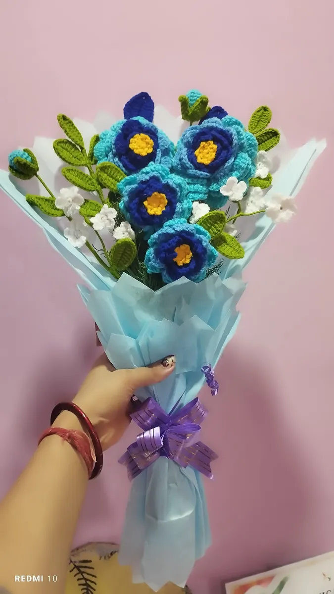 Handmade crochet blue flower bouquet in blue