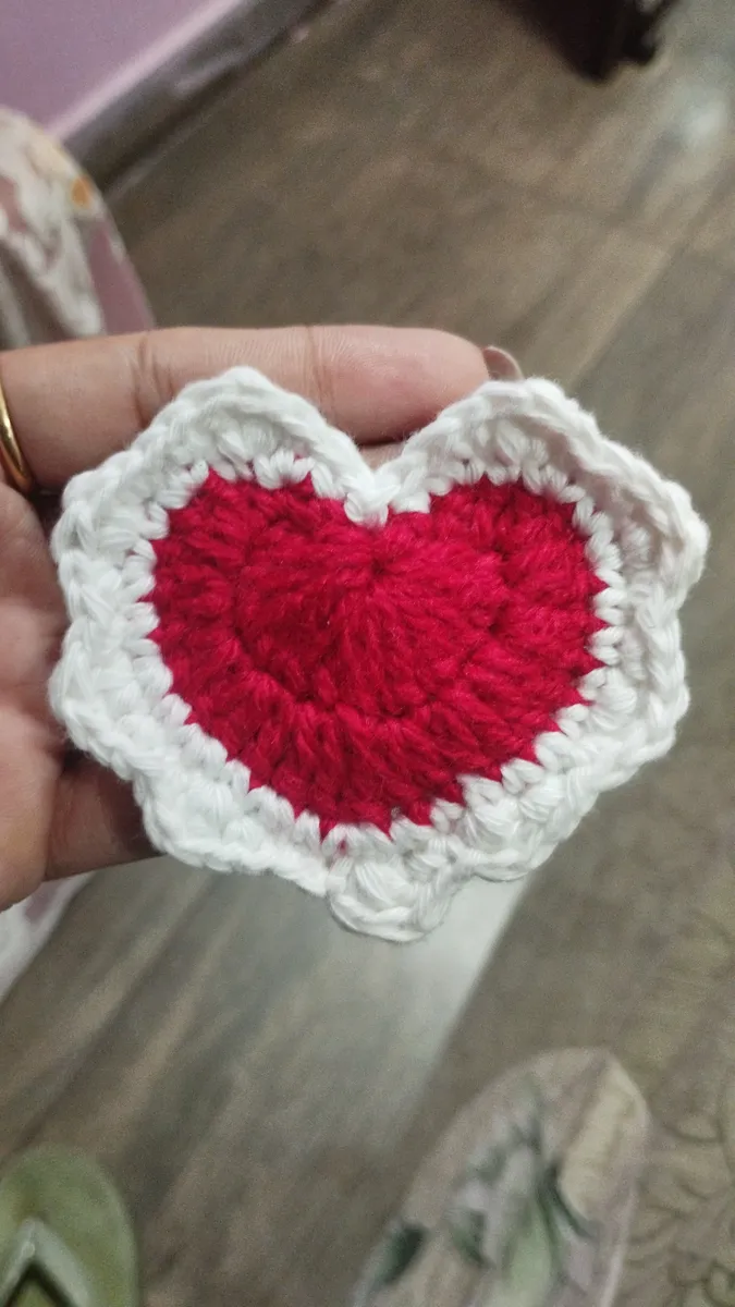 Handmade crochet heart coaster in red & white