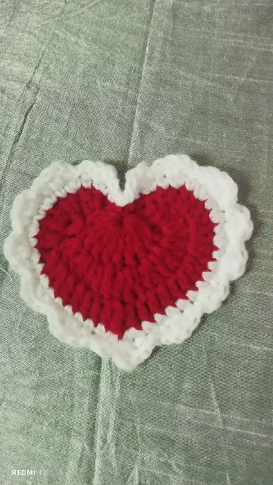 Handmade crochet heart coaster in red & white