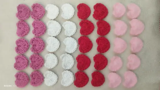 Handmade crochet mini hearts in pink, white & red
