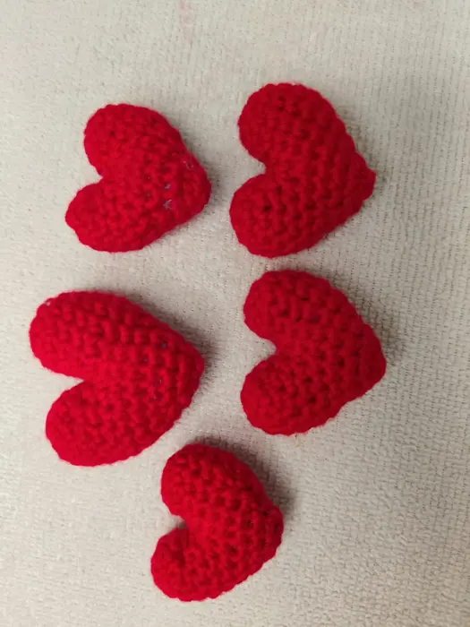 Handmade crochet puffy hearts in red