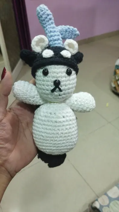Handmade crochet bear in cow hood in white & black