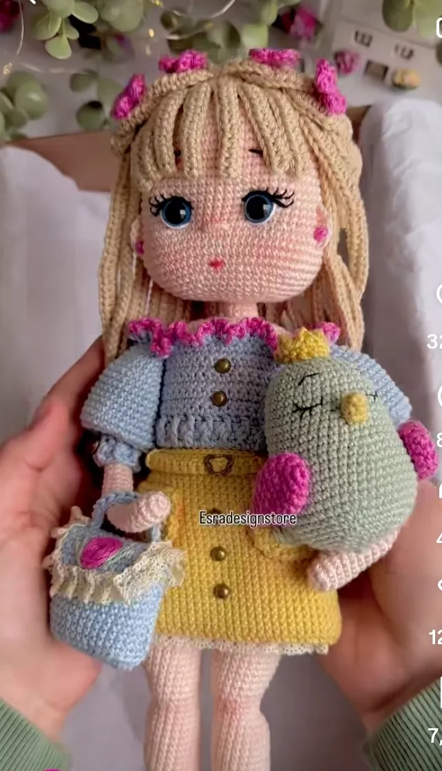 Handmade crochet girl doll with pet in blue & yellow