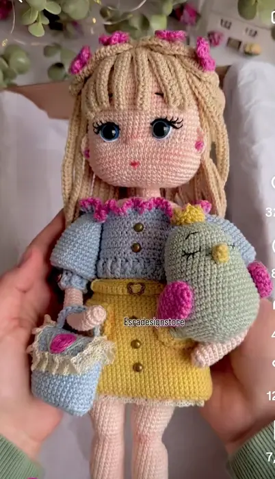 Handmade crochet girl doll with pet in blue & yellow