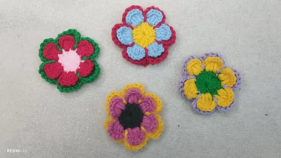 Handmade crochet layered flowers in multicolour