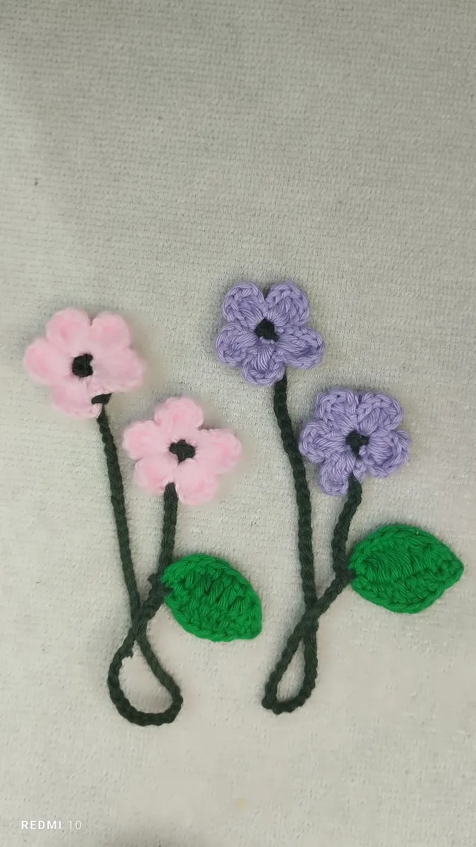 Handmade crochet flower stems in pink & purple
