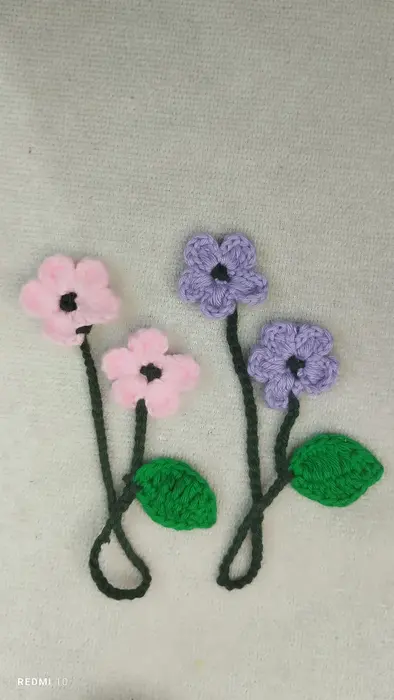 Handmade crochet flower stems in pink & purple