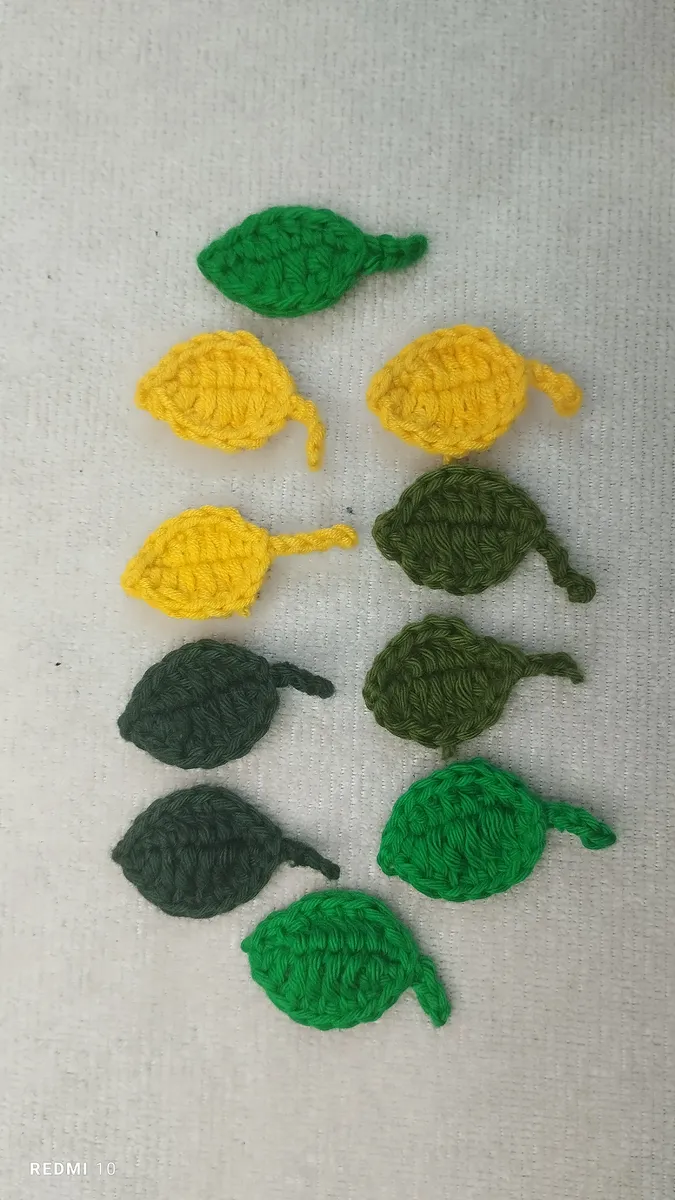 Handmade crochet leaves in green & yellow