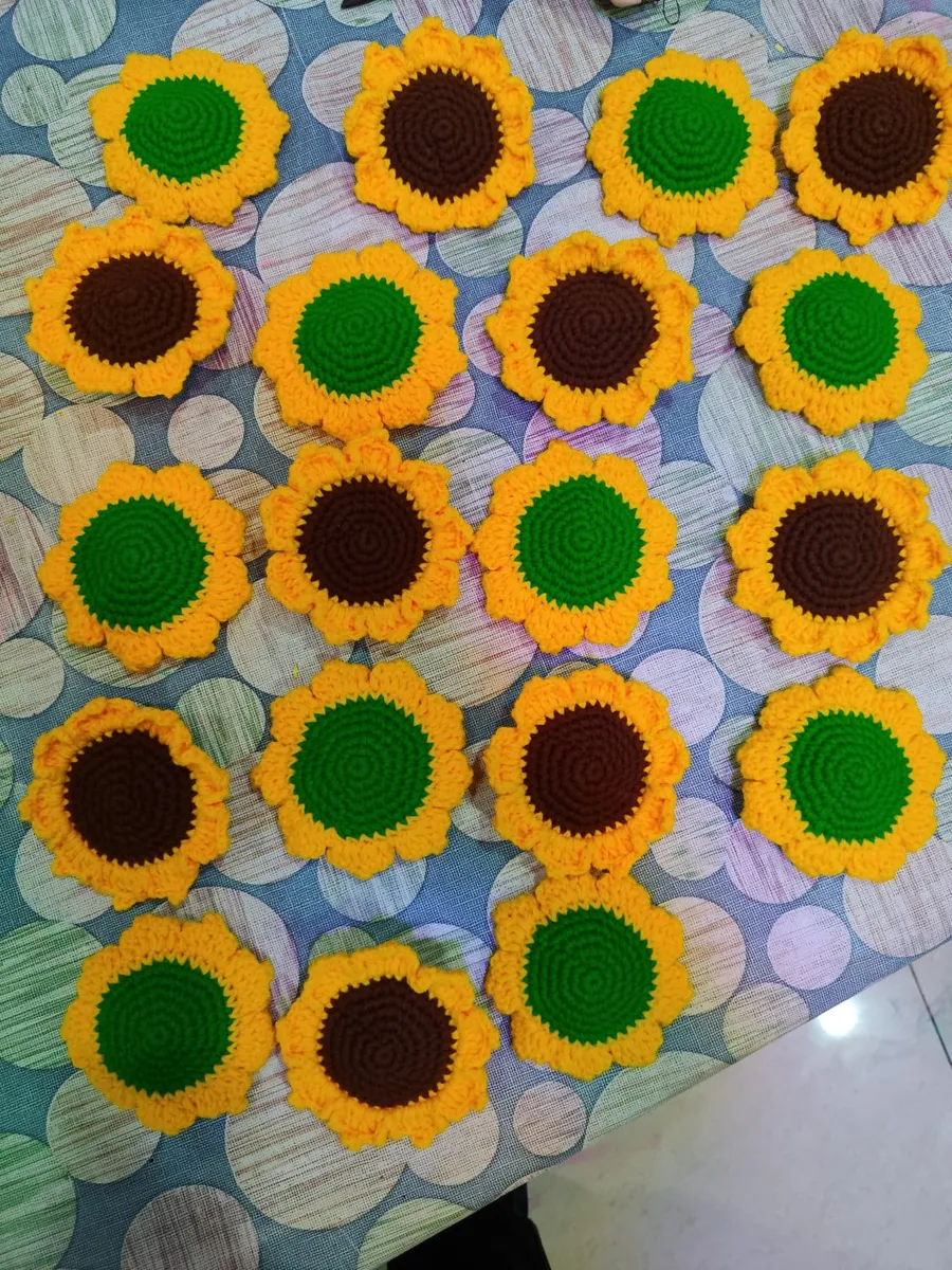 Handmade crochet sunflowers in yellow, green & brown