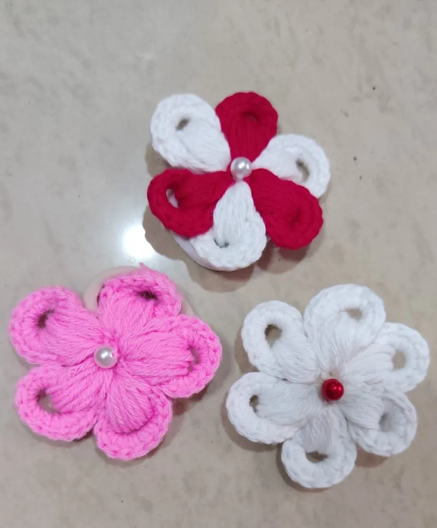 Handmade crochet flower hair ties in red, pink & white