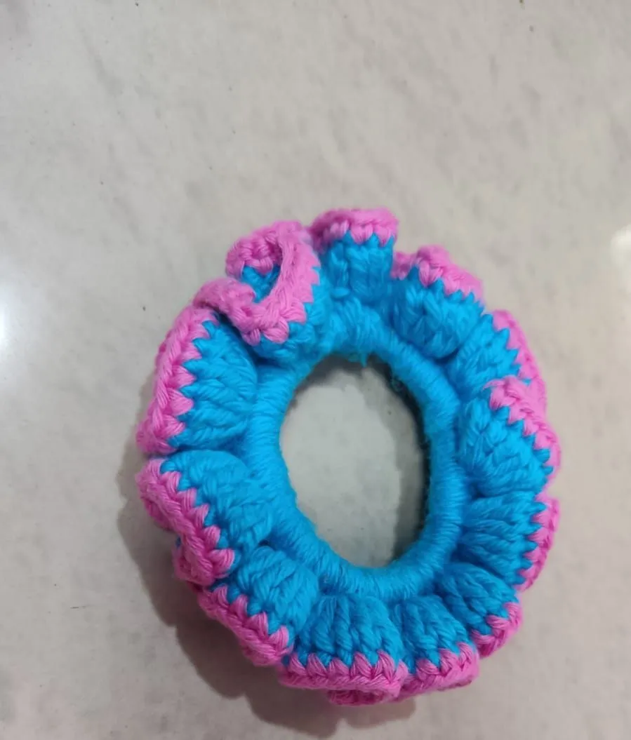 Handmade crochet ruffled scrunchie in blue and pink