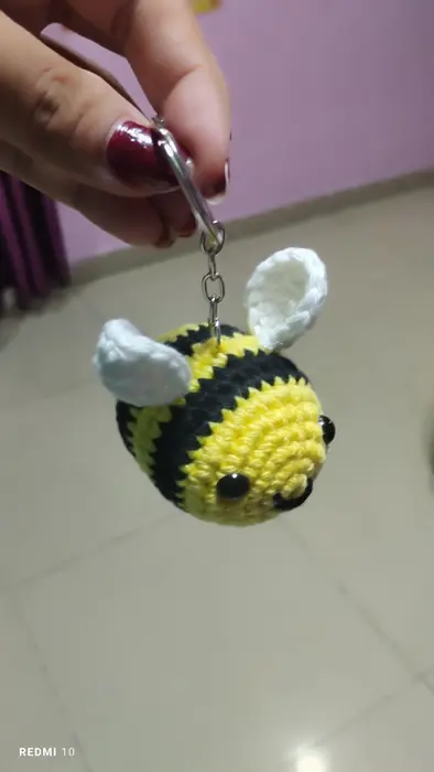 Handmade crochet bumble bee keychain in yellow & black