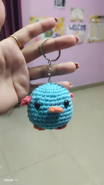 Handmade crochet chick keychain in blue