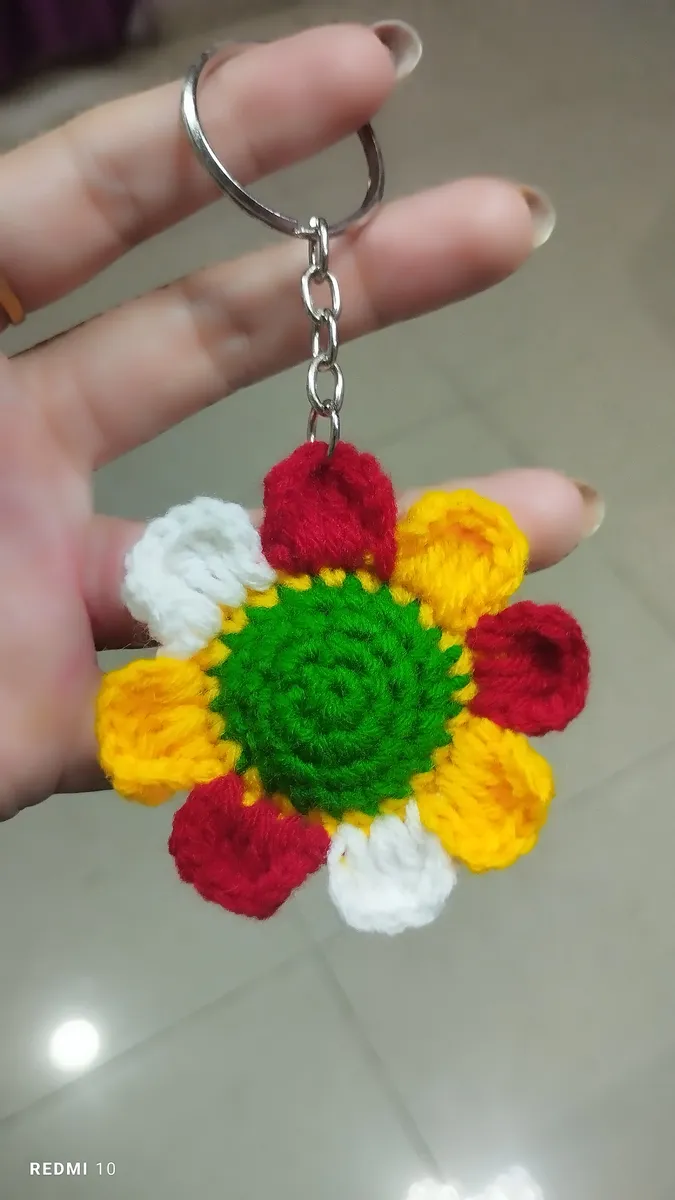 Handmade crochet flower keychain in multicolour