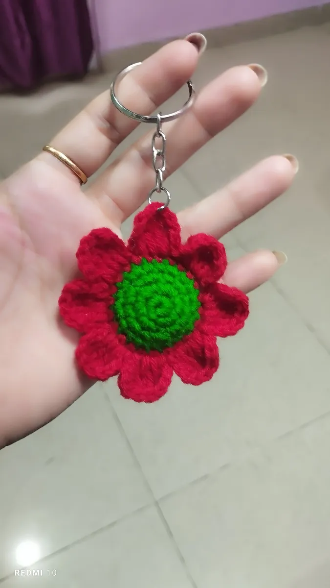 Handmade crochet flower keychain in red & green