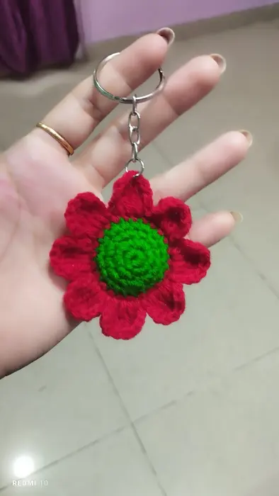Handmade crochet flower keychain in red & green