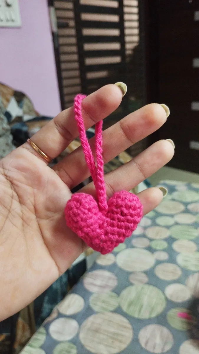 Handmade crochet heart charm in hot pink