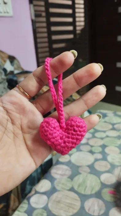 Handmade crochet heart charm in hot pink