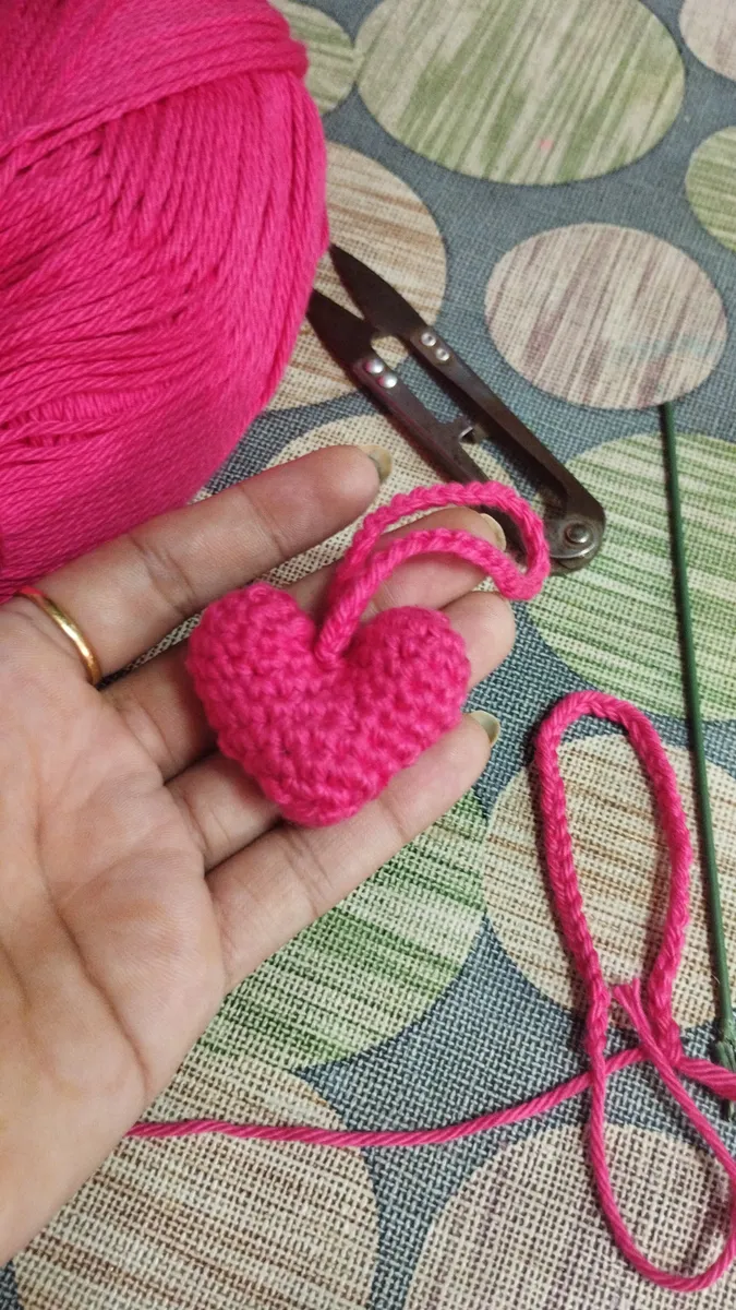Handmade crochet heart charm in hot pink