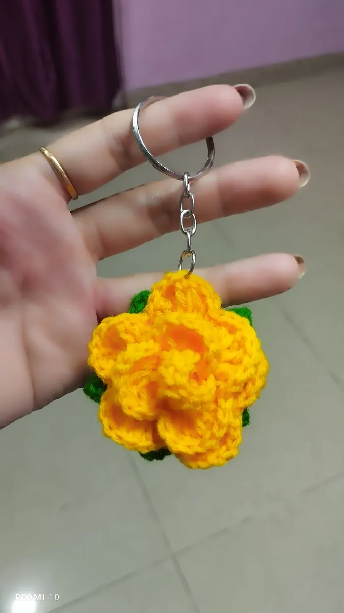Handmade crochet rose keychain in yellow