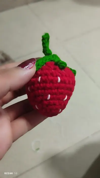 Handmade crochet strawberry keychain in red & green