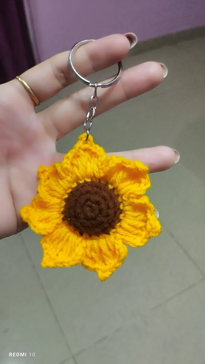 Handmade crochet sunflower keychain in yellow & brown