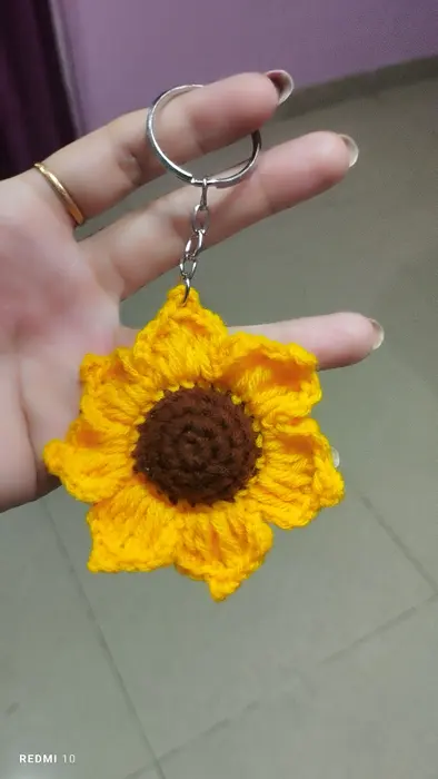 Handmade crochet sunflower keychain in yellow & brown