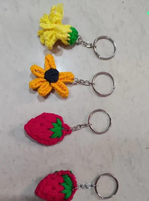 Handmade crochet sunflower & strawberry keychains in yellow & red