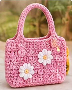 Pink crochet handbag with white flowers